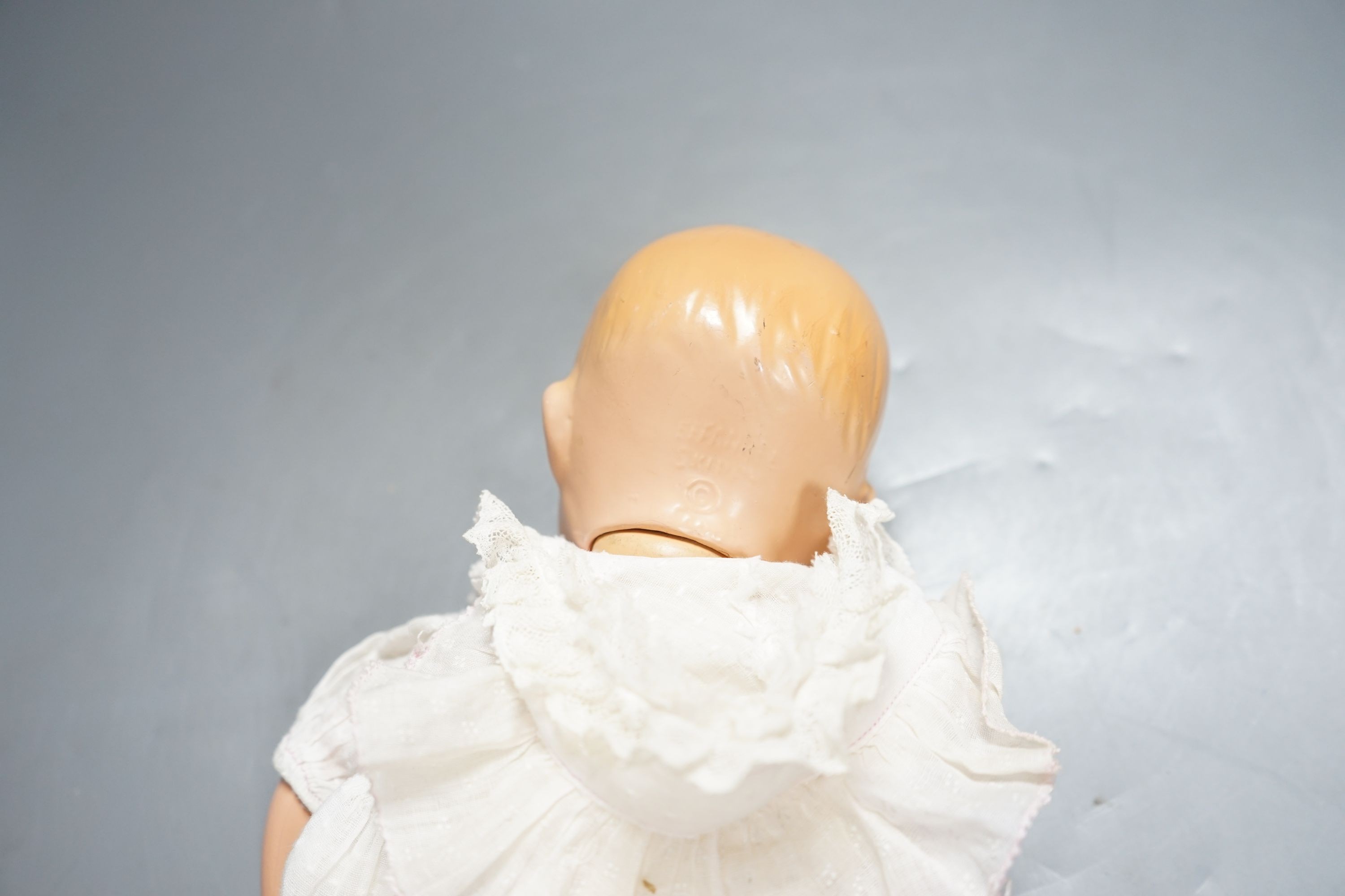 An Effanbee toddler doll, height 13in., in good condition